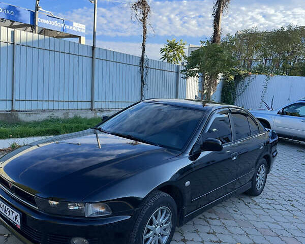 Чорний Міцубісі Галант, об'ємом двигуна 2 л та пробігом 330 тис. км за 5000 $, фото 1 на Automoto.ua