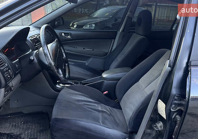 Черный Мицубиси Галант, объемом двигателя 2.5 л и пробегом 360 тыс. км за 2999 $, фото 14 на Automoto.ua