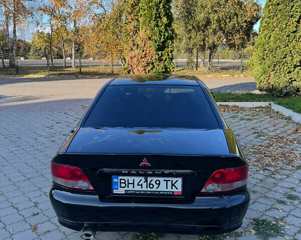 Чорний Міцубісі Галант, об'ємом двигуна 2 л та пробігом 330 тис. км за 5000 $, фото 4 на Automoto.ua