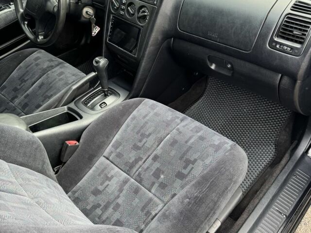 Черный Мицубиси Галант, объемом двигателя 2 л и пробегом 164 тыс. км за 5000 $, фото 2 на Automoto.ua