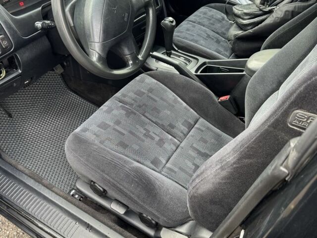 Черный Мицубиси Галант, объемом двигателя 2 л и пробегом 164 тыс. км за 5000 $, фото 3 на Automoto.ua