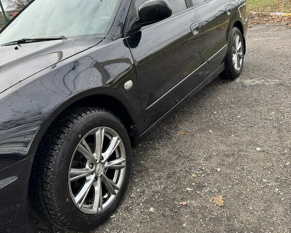 Чорний Міцубісі Галант, об'ємом двигуна 2 л та пробігом 164 тис. км за 5000 $, фото 1 на Automoto.ua