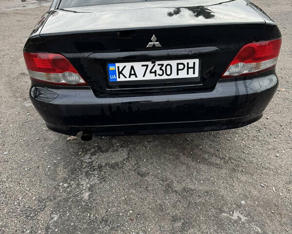 Чорний Міцубісі Галант, об'ємом двигуна 2 л та пробігом 164 тис. км за 5000 $, фото 2 на Automoto.ua