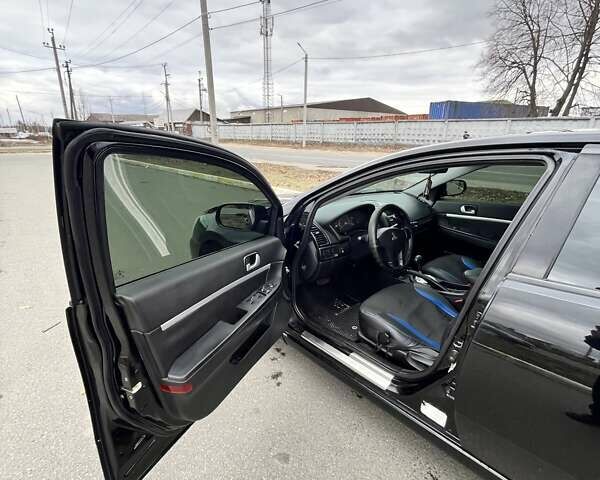 Черный Мицубиси Галант, объемом двигателя 2.38 л и пробегом 388 тыс. км за 5000 $, фото 5 на Automoto.ua