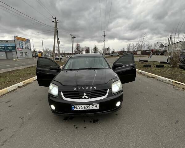 Черный Мицубиси Галант, объемом двигателя 2.38 л и пробегом 388 тыс. км за 5000 $, фото 1 на Automoto.ua