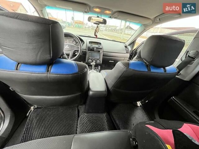 Черный Мицубиси Галант, объемом двигателя 2.38 л и пробегом 388 тыс. км за 5000 $, фото 12 на Automoto.ua