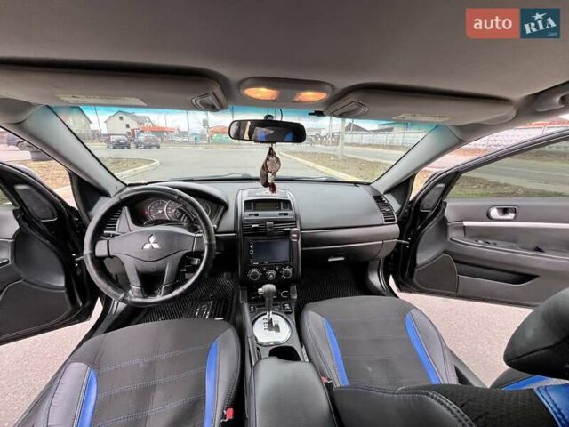 Черный Мицубиси Галант, объемом двигателя 2.38 л и пробегом 388 тыс. км за 5000 $, фото 11 на Automoto.ua