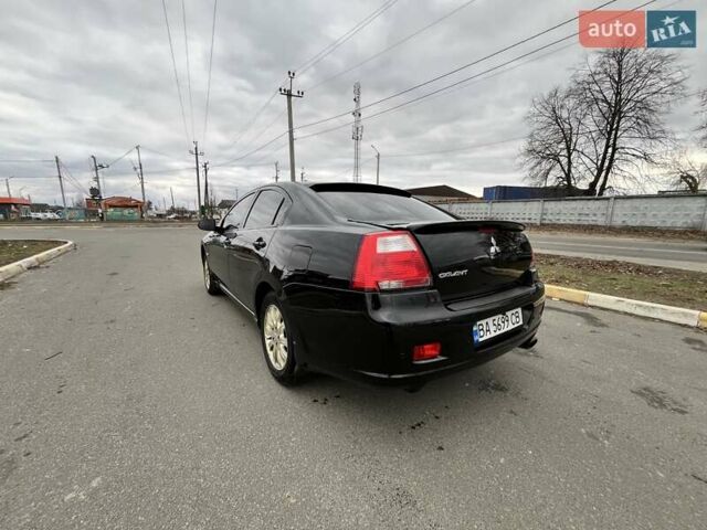 Черный Мицубиси Галант, объемом двигателя 2.38 л и пробегом 388 тыс. км за 5000 $, фото 4 на Automoto.ua