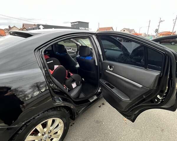 Черный Мицубиси Галант, объемом двигателя 2.38 л и пробегом 388 тыс. км за 5000 $, фото 9 на Automoto.ua