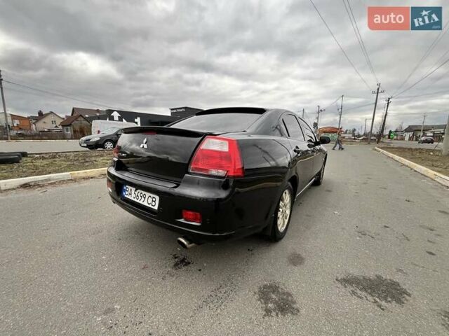 Черный Мицубиси Галант, объемом двигателя 2.38 л и пробегом 388 тыс. км за 5000 $, фото 16 на Automoto.ua
