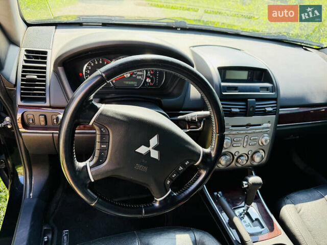Черный Мицубиси Галант, объемом двигателя 2.4 л и пробегом 275 тыс. км за 5300 $, фото 1 на Automoto.ua