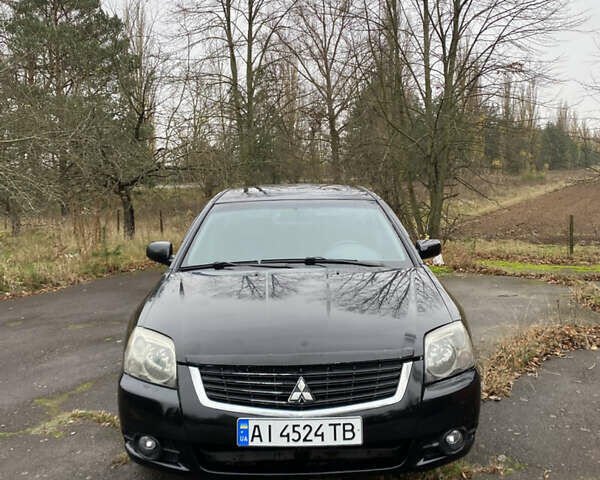 Черный Мицубиси Галант, объемом двигателя 2.4 л и пробегом 341 тыс. км за 5500 $, фото 1 на Automoto.ua