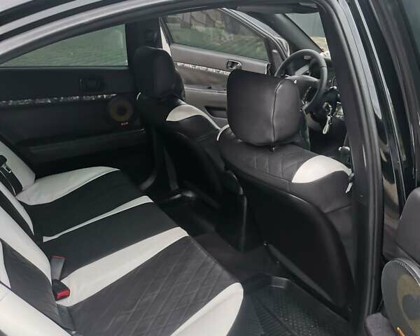 Черный Мицубиси Галант, объемом двигателя 2.38 л и пробегом 193 тыс. км за 7200 $, фото 12 на Automoto.ua