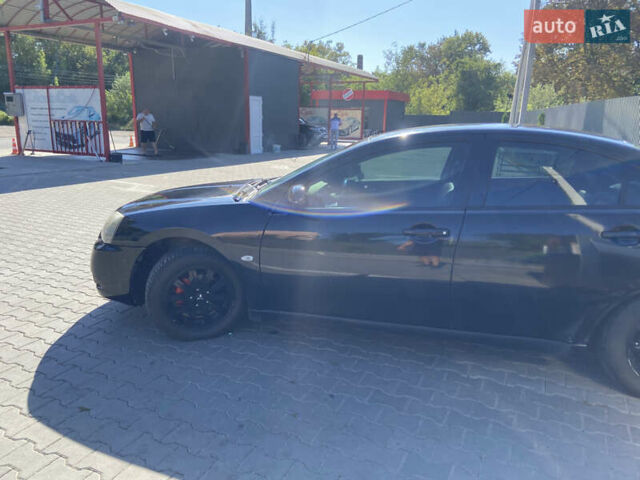 Черный Мицубиси Галант, объемом двигателя 2.38 л и пробегом 408 тыс. км за 5200 $, фото 8 на Automoto.ua