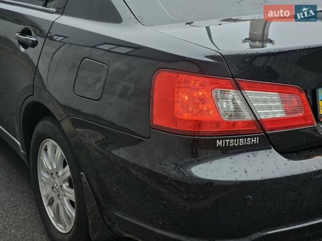 Черный Мицубиси Галант, объемом двигателя 2.38 л и пробегом 94 тыс. км за 12500 $, фото 24 на Automoto.ua
