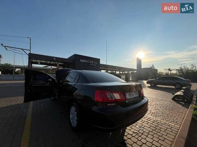 Черный Мицубиси Галант, объемом двигателя 2.38 л и пробегом 163 тыс. км за 6800 $, фото 6 на Automoto.ua