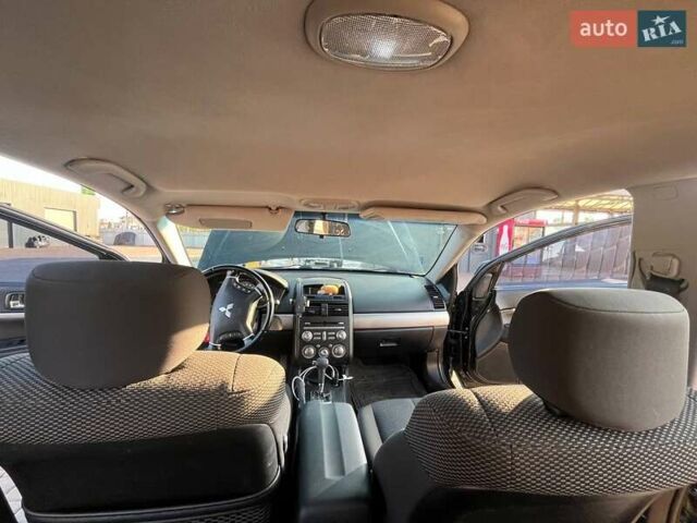 Черный Мицубиси Галант, объемом двигателя 2.38 л и пробегом 163 тыс. км за 6800 $, фото 11 на Automoto.ua