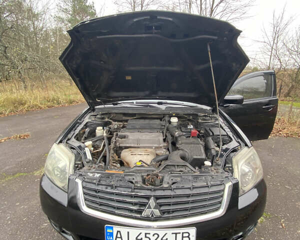 Черный Мицубиси Галант, объемом двигателя 2.4 л и пробегом 341 тыс. км за 5500 $, фото 16 на Automoto.ua