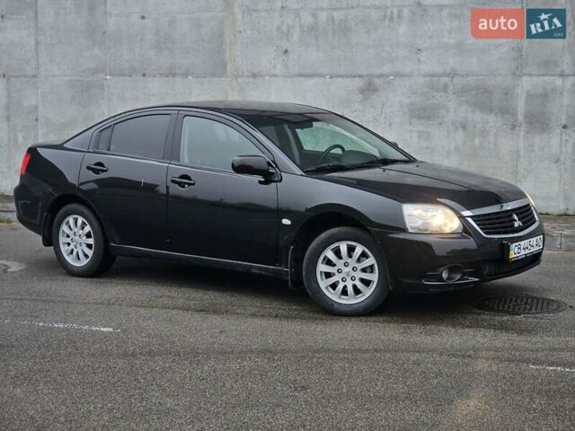 Черный Мицубиси Галант, объемом двигателя 2.38 л и пробегом 94 тыс. км за 12500 $, фото 31 на Automoto.ua