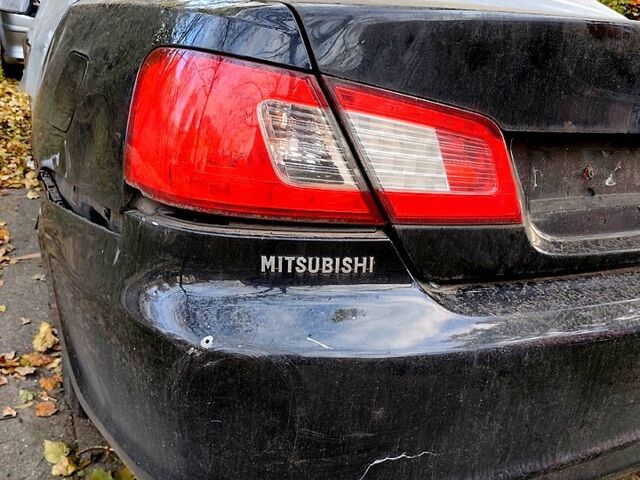 Черный Мицубиси Галант, объемом двигателя 2.4 л и пробегом 185 тыс. км за 2496 $, фото 4 на Automoto.ua