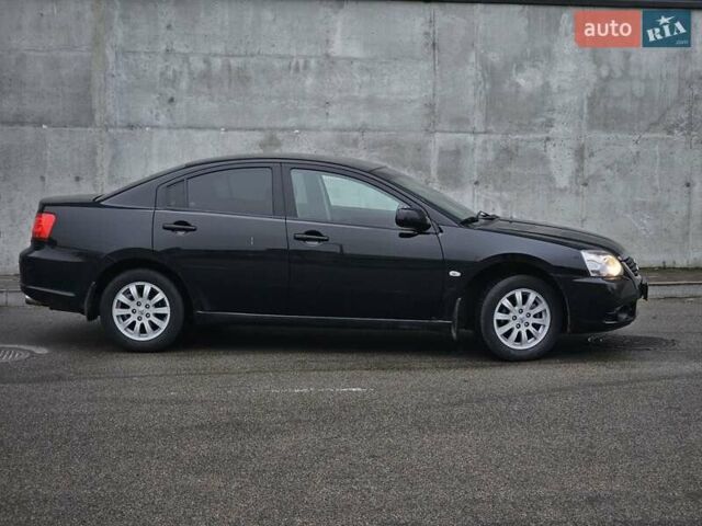 Черный Мицубиси Галант, объемом двигателя 2.38 л и пробегом 94 тыс. км за 12500 $, фото 1 на Automoto.ua