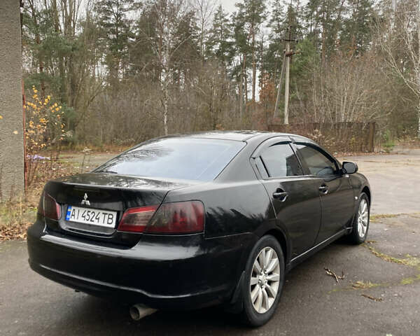 Черный Мицубиси Галант, объемом двигателя 2.4 л и пробегом 341 тыс. км за 5500 $, фото 6 на Automoto.ua