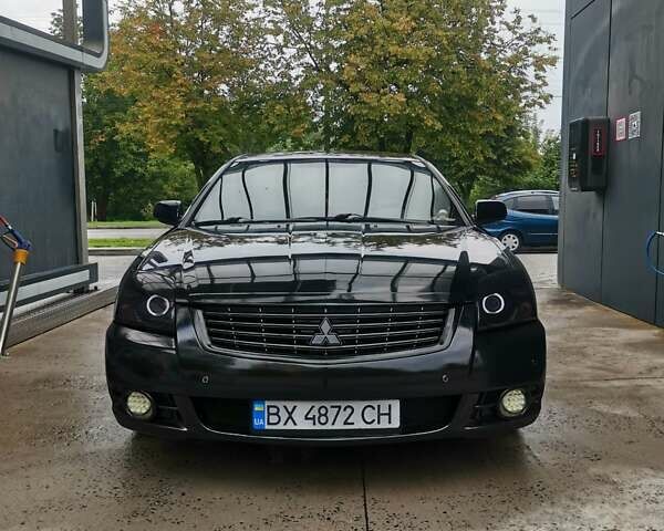 Черный Мицубиси Галант, объемом двигателя 2.38 л и пробегом 193 тыс. км за 7200 $, фото 1 на Automoto.ua