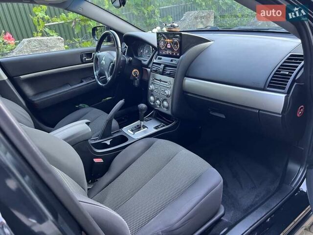 Черный Мицубиси Галант, объемом двигателя 2.38 л и пробегом 100 тыс. км за 6900 $, фото 11 на Automoto.ua