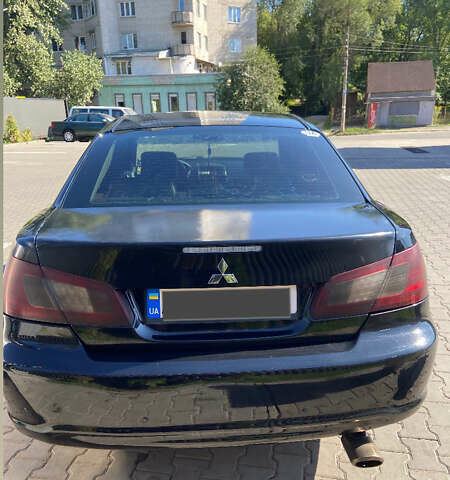 Черный Мицубиси Галант, объемом двигателя 2.38 л и пробегом 408 тыс. км за 5200 $, фото 1 на Automoto.ua