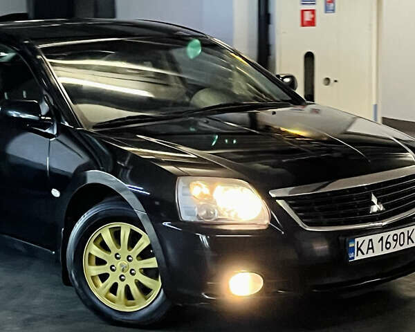 Черный Мицубиси Галант, объемом двигателя 2.4 л и пробегом 262 тыс. км за 6500 $, фото 2 на Automoto.ua