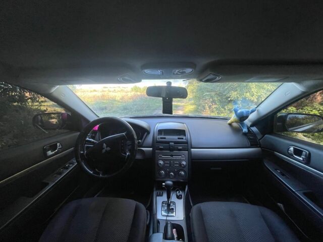 Черный Мицубиси Галант, объемом двигателя 2.4 л и пробегом 265 тыс. км за 5400 $, фото 6 на Automoto.ua