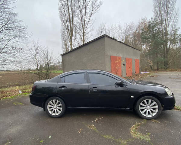 Черный Мицубиси Галант, объемом двигателя 2.4 л и пробегом 341 тыс. км за 5500 $, фото 7 на Automoto.ua