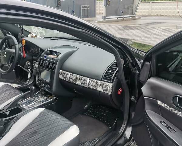 Черный Мицубиси Галант, объемом двигателя 2.38 л и пробегом 193 тыс. км за 7200 $, фото 10 на Automoto.ua