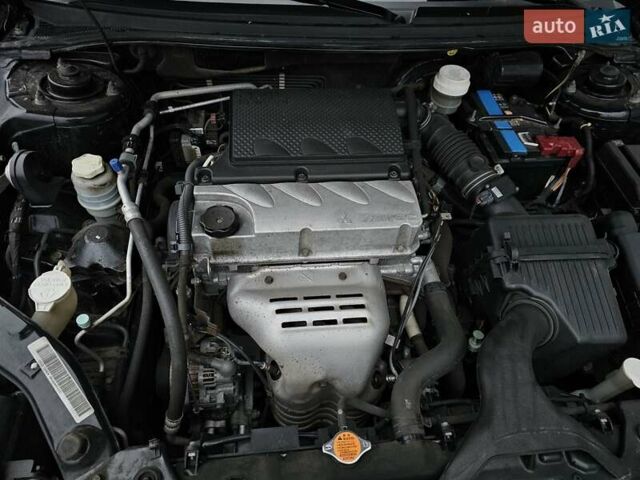 Черный Мицубиси Галант, объемом двигателя 2.38 л и пробегом 94 тыс. км за 12500 $, фото 12 на Automoto.ua