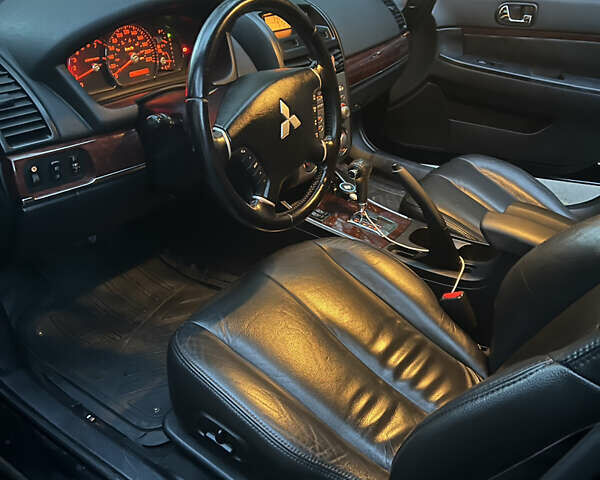 Черный Мицубиси Галант, объемом двигателя 2.38 л и пробегом 143 тыс. км за 6700 $, фото 8 на Automoto.ua