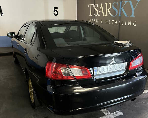 Черный Мицубиси Галант, объемом двигателя 2.4 л и пробегом 262 тыс. км за 6500 $, фото 1 на Automoto.ua