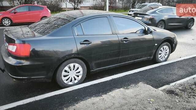 Черный Мицубиси Галант, объемом двигателя 2.4 л и пробегом 255 тыс. км за 4999 $, фото 2 на Automoto.ua