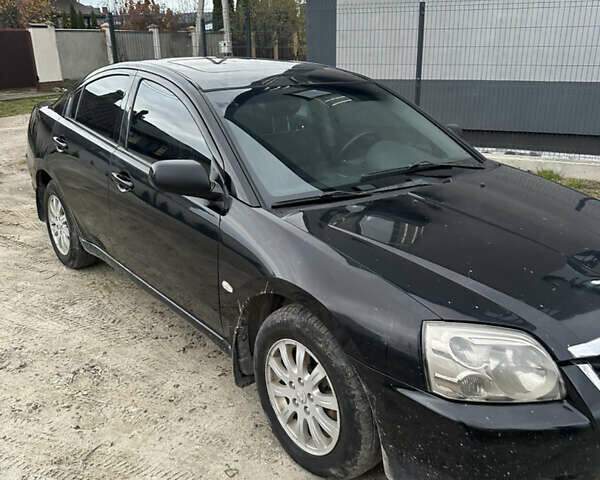 Черный Мицубиси Галант, объемом двигателя 2.38 л и пробегом 560 тыс. км за 3300 $, фото 6 на Automoto.ua