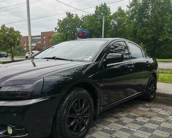 Черный Мицубиси Галант, объемом двигателя 2.38 л и пробегом 193 тыс. км за 7200 $, фото 3 на Automoto.ua