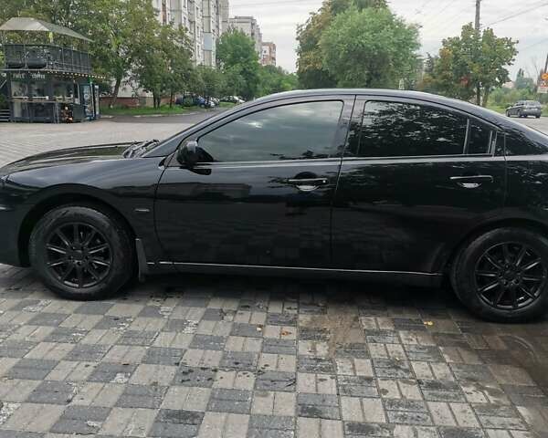 Черный Мицубиси Галант, объемом двигателя 2.38 л и пробегом 193 тыс. км за 7200 $, фото 5 на Automoto.ua