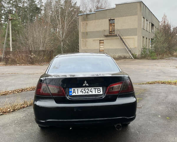 Черный Мицубиси Галант, объемом двигателя 2.4 л и пробегом 341 тыс. км за 5500 $, фото 5 на Automoto.ua