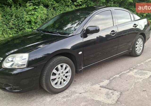 Чорний Міцубісі Галант, об'ємом двигуна 2.4 л та пробігом 315 тис. км за 5500 $, фото 1 на Automoto.ua