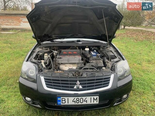 Чорний Міцубісі Галант, об'ємом двигуна 2.4 л та пробігом 12 тис. км за 8000 $, фото 13 на Automoto.ua