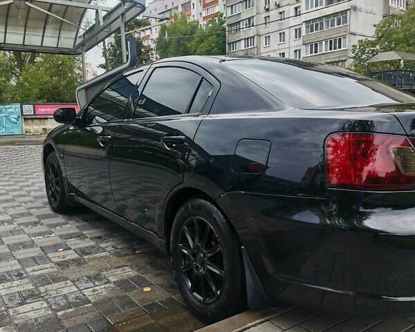 Черный Мицубиси Галант, объемом двигателя 2.38 л и пробегом 193 тыс. км за 7200 $, фото 7 на Automoto.ua