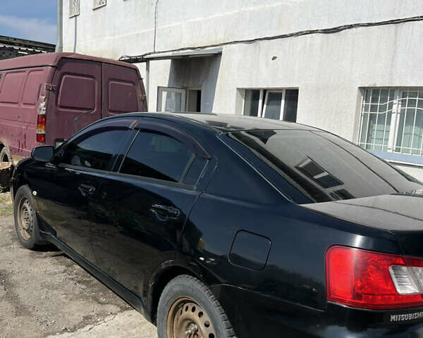 Черный Мицубиси Галант, объемом двигателя 2.4 л и пробегом 451 тыс. км за 4500 $, фото 6 на Automoto.ua