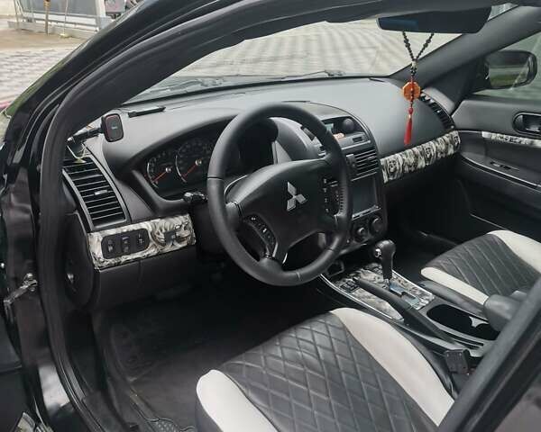 Черный Мицубиси Галант, объемом двигателя 2.38 л и пробегом 193 тыс. км за 7200 $, фото 9 на Automoto.ua