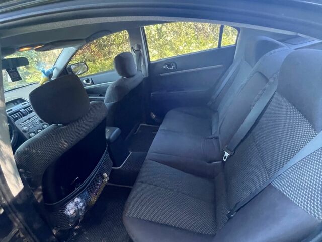 Черный Мицубиси Галант, объемом двигателя 2.4 л и пробегом 265 тыс. км за 5400 $, фото 7 на Automoto.ua