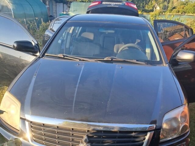 Черный Мицубиси Галант, объемом двигателя 2.4 л и пробегом 255 тыс. км за 5000 $, фото 6 на Automoto.ua