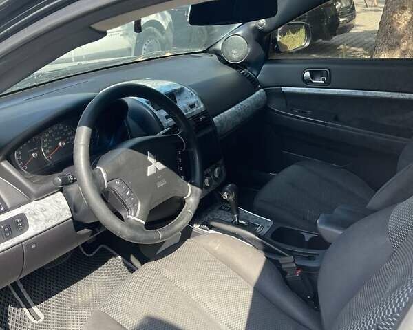 Чорний Міцубісі Галант, об'ємом двигуна 2.4 л та пробігом 320 тис. км за 5446 $, фото 3 на Automoto.ua