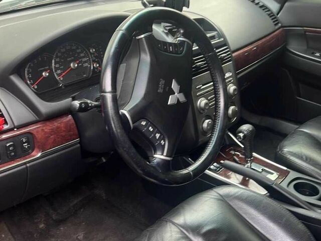 Черный Мицубиси Галант, объемом двигателя 2.4 л и пробегом 450 тыс. км за 4500 $, фото 4 на Automoto.ua